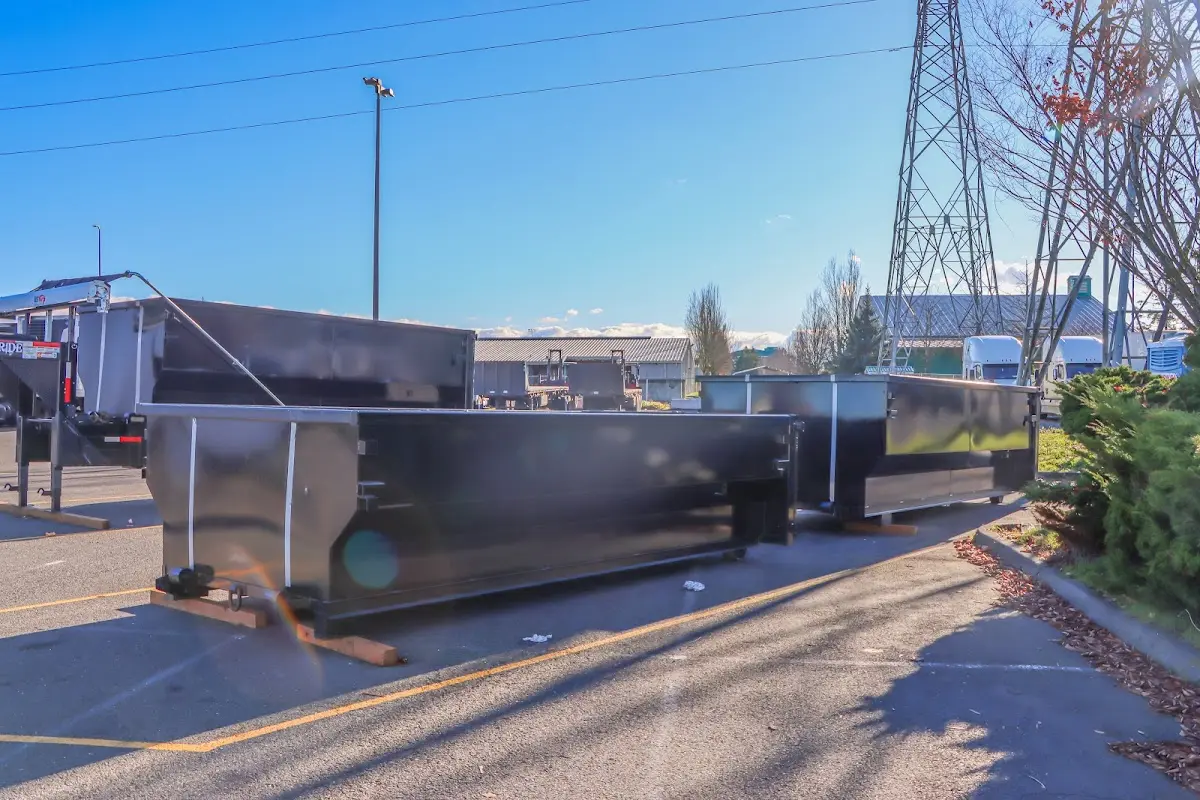 Roll-off dumpster ready for waste disposal at job site for 3 Yard Dumpster Rental in Waynesville